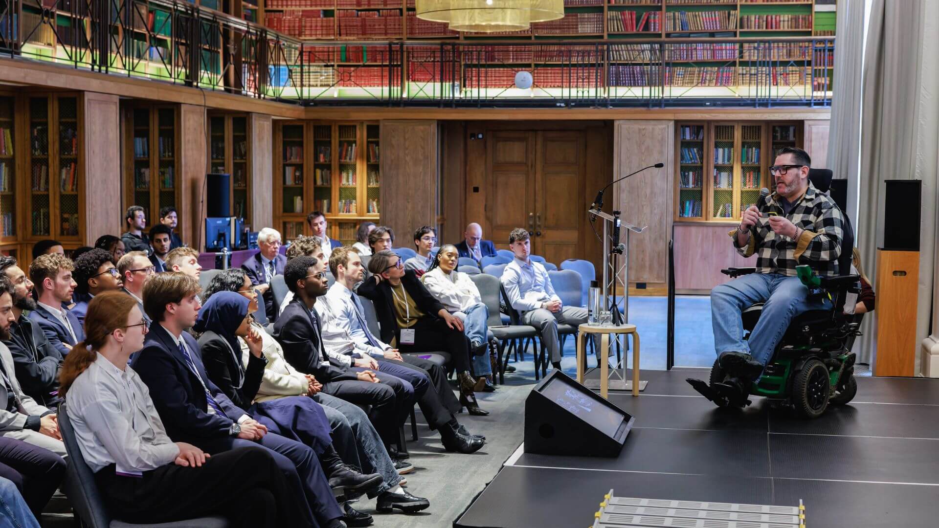 Inspirational Motivational Keynote Speaker Nick Wilson talking on a stage at an event Disabled Adventurer (1) (1)